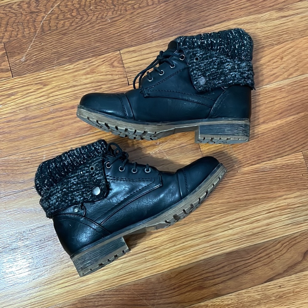 Trendy black combat boots